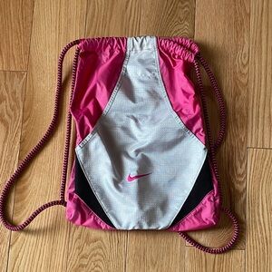 Nike Pink and Silver Drawstring Backpack with Black Accents